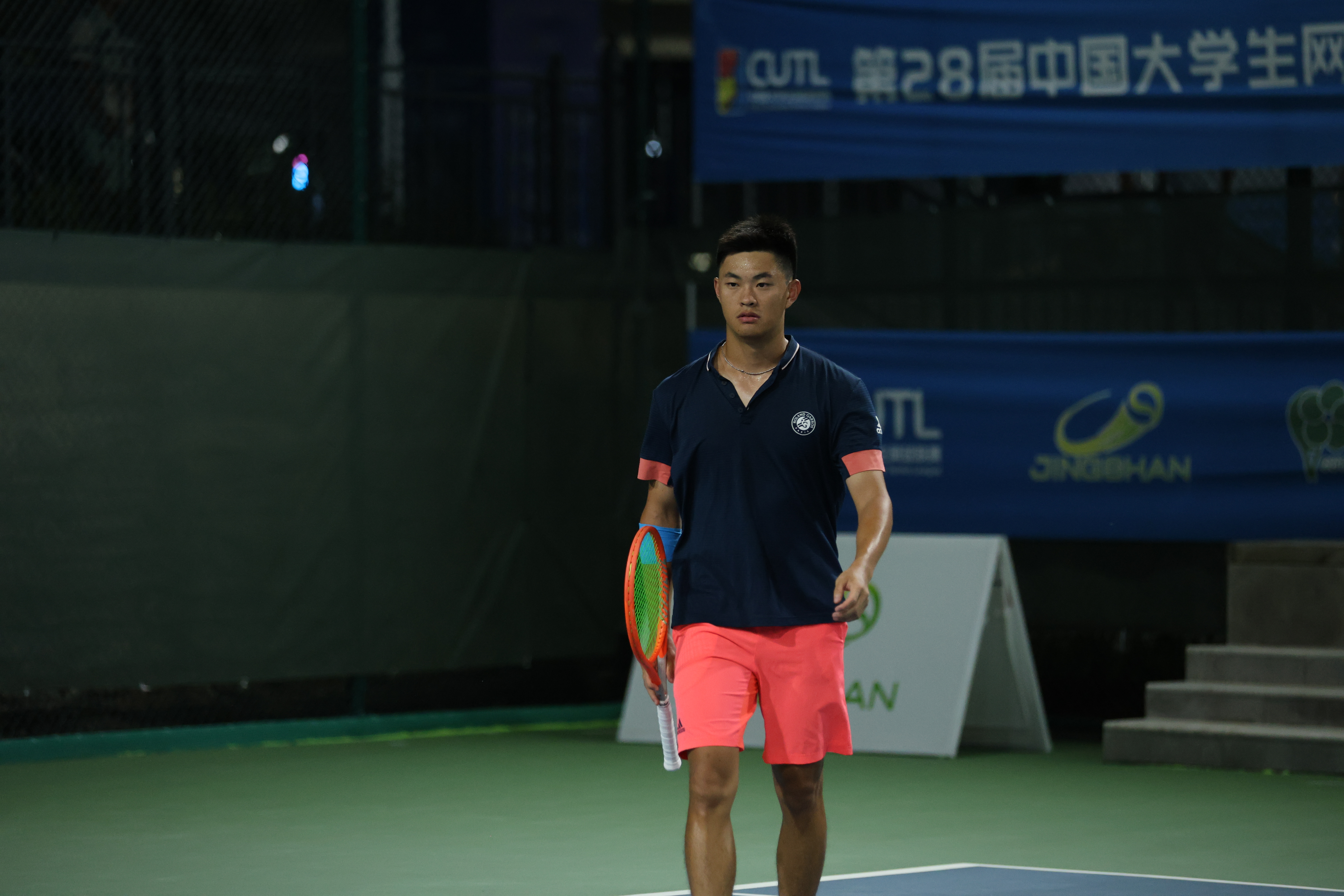 Kevin Xue on a tennis court